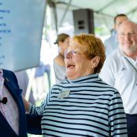 Chick Blue and Brian Kelly laughing at the Jamie Hosford Football Center dedication.
